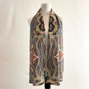 Sophisticated scarf in muted earthy colors.